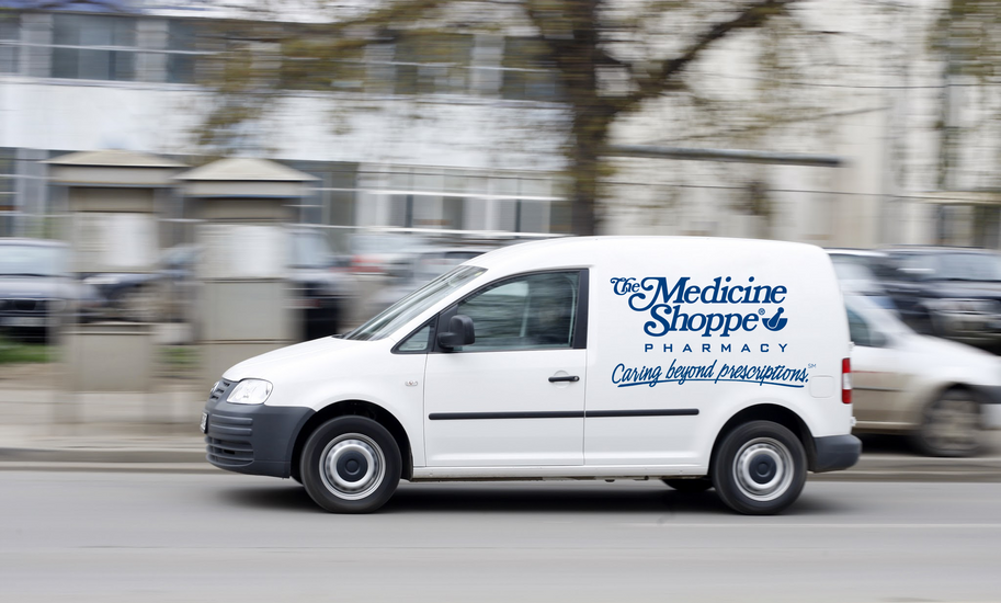 A delivery vehicle with the Citizens Drug Store logo on the side Delivery